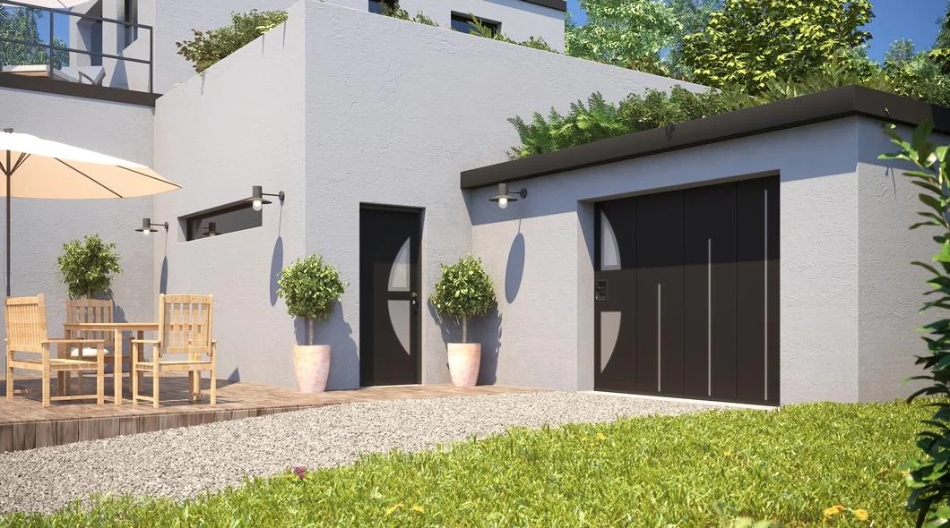Porte de garage sectionnelle en aluminium gris anthracite posée sur une maison contemporaine à La Souterraine