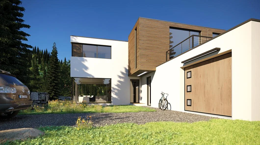 Porte de garage sectionnelle finition bois sur une maison contemporaine à bardage bois, à La Souterraine
